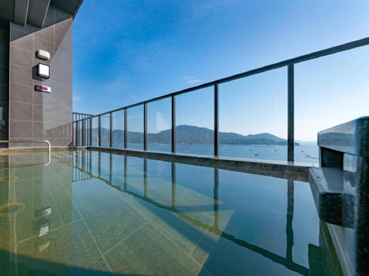 LiVEMAX RESORT Miyahama Onsen OCEAN Hatsukaichi Bagian luar foto