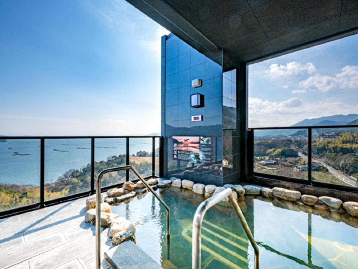 LiVEMAX RESORT Miyahama Onsen OCEAN Hatsukaichi Bagian luar foto